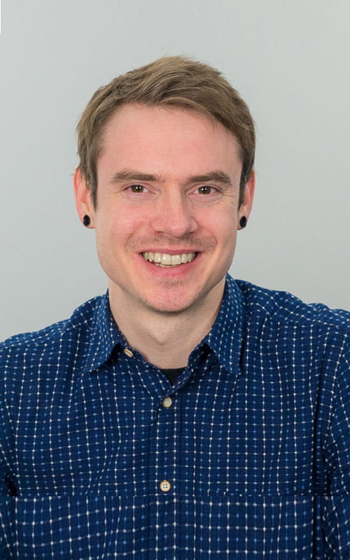 a man smiling for the camera