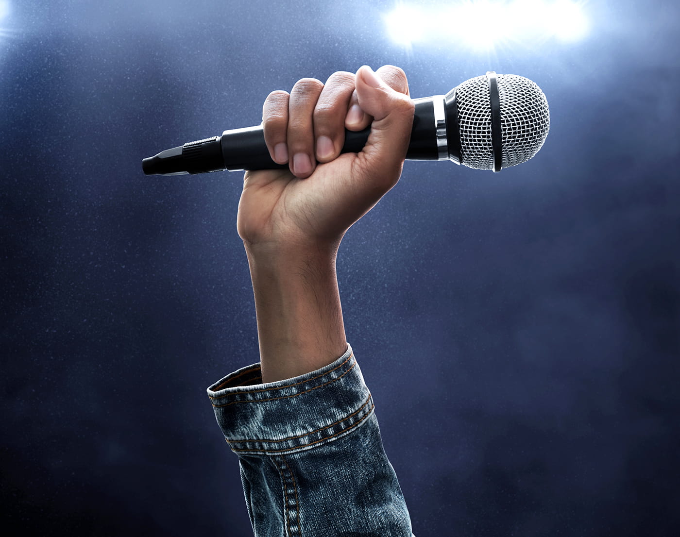 a person holding a microphone